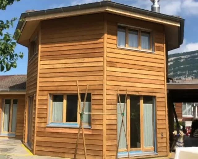 Gommage et sablage d'une maison en bois à Lancy