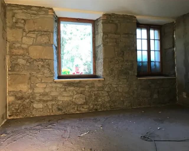 Sablage et nettoyage mur en pierre d'un restaurant